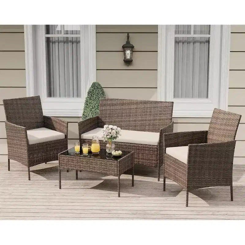 Set da 4 mobili da esterno per patio, mobili in vimini rattan con morbidi cuscini e tavolino da caffè in vetro temperato, set da patio per tutte le stagioni