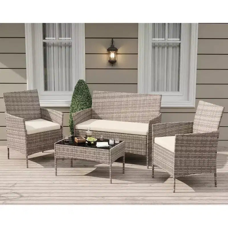 Set da 4 mobili da esterno per patio, mobili in vimini rattan con morbidi cuscini e tavolino da caffè in vetro temperato, set da patio per tutte le stagioni