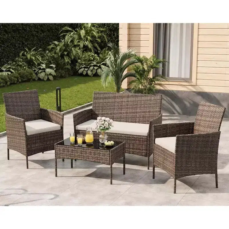 Set da 4 mobili da esterno per patio, mobili in vimini rattan con morbidi cuscini e tavolino da caffè in vetro temperato, set da patio per tutte le stagioni